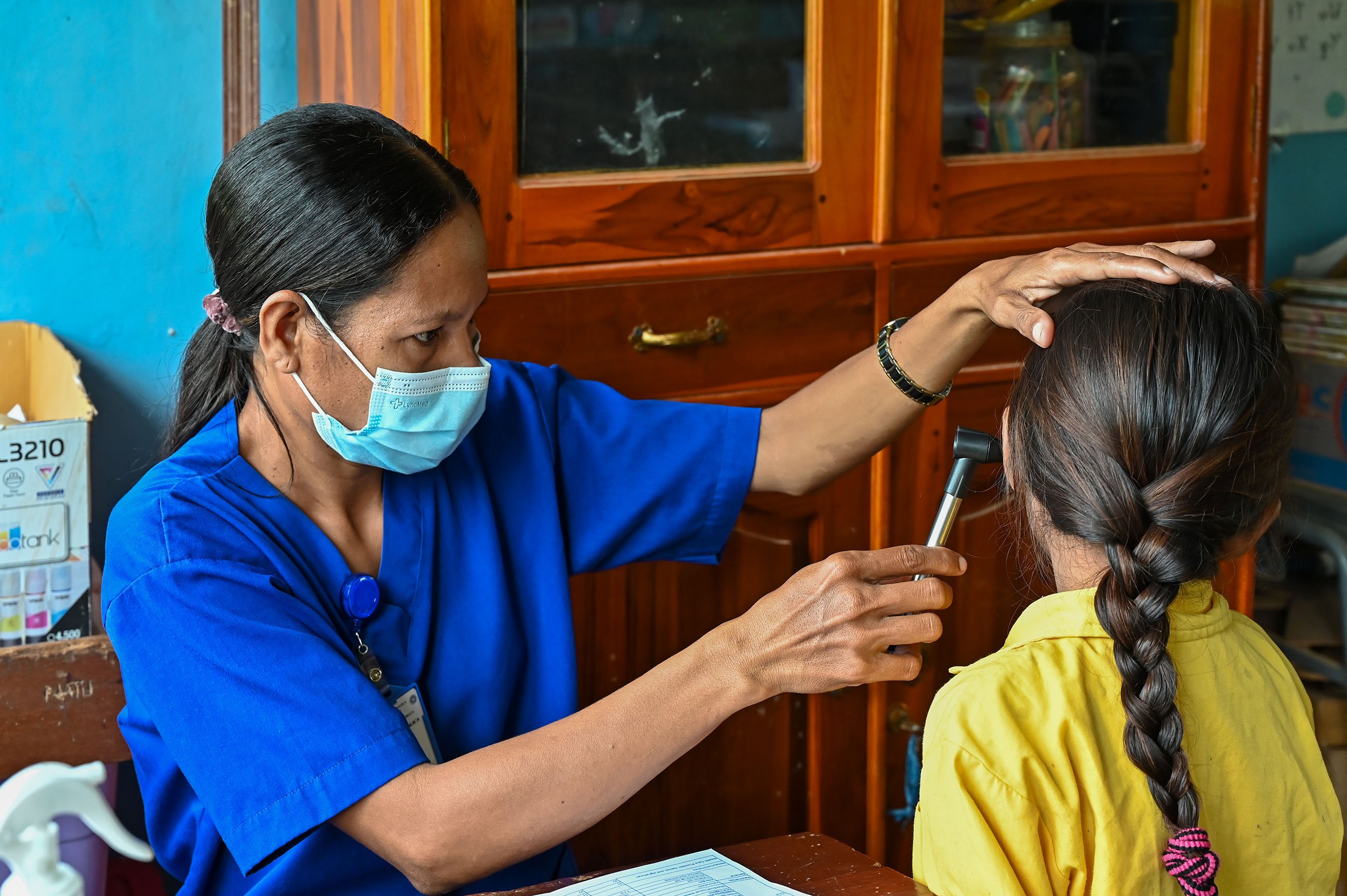 A child undergoing ear examination